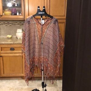 Maurice’s Cute sheer poncho with side and bottom fringe!  Great for spring!